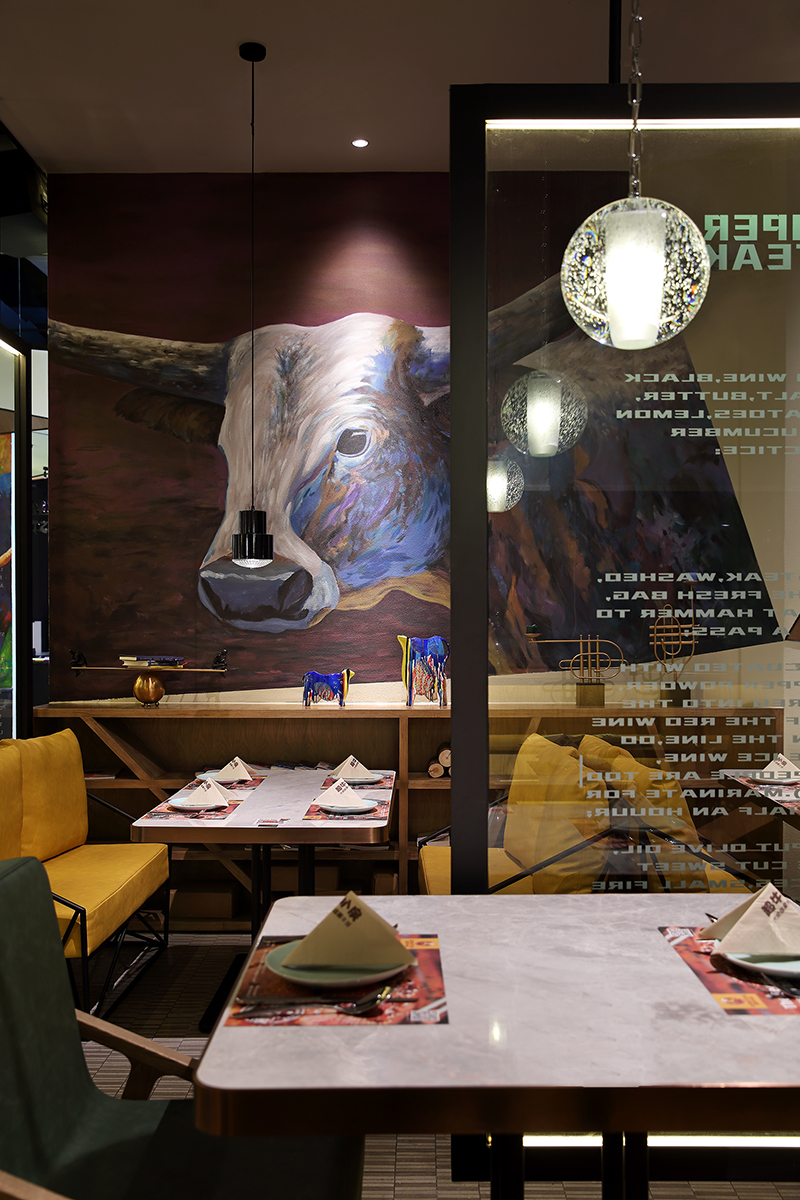 牛排餐廳裝飾布局圖,牛排餐廳空間設(shè)計(jì)效果圖