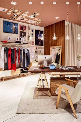 女服裝店室內(nèi)背景墻壁紙裝修效果圖片